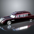 Vintage Luxury Burgundy Limousine With Streamlined Design Multiple Windows And Silver Wheels