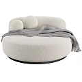 Round Shaped Beige Fuzzy Single Sofa With Gray Blanket And Circular Cushions
