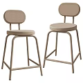 Stylish Two Modern Upholstered Bar Stools With Sleek Metal Frames And Beige Seats