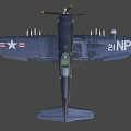 Dark Colored US Navy Fighter Jet Featuring Stars On Wings And Underwing Ammunition