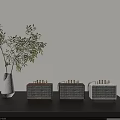 Vintage Style Radios In Different Colors On Black Table With White Vase And Green Branches