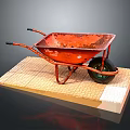 Red Rusty Wheelbarrow Placed On Grid Patterned Wooden Display Stand 3d model