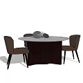 Round Dining Table Set With Four Brown Chairs And Decorative Items 3d model