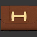 Brown Leather Clutch With Gold H Logo And Elegant Smooth Design