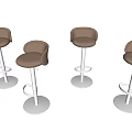 Four Beige Modern Bar Stools With Metal Base And Comfortable Seats For Home Bar