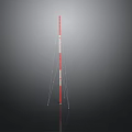 Red And White Striped Pole With White Guy Wires On Dark Background