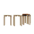 Three Light Wooden Stools With Cartoon Patterns And Brown Round Seat Design