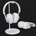 Brown Leather Headphones With Silver Metal Accents On Stand And Placed
