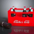 Red Clarke's Cola Crate Display With Glass Bottles And Spilled Bottle