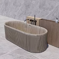 Modern Oval Bathtub with Ribbed Design and Wooden Cabinet White Bottles on Grey Marble Floor