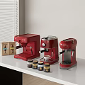 Red Kitchen Appliances Including Coffee Makers On White Countertop With Jars And Box