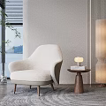 Beige Single Sofa In Modern Living Room With Side Table Floor Lamp And Lake View