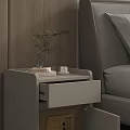 Modern Bedside Table With Open Drawer Small Plant Cup And Book Next To Bed