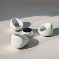 Modern White Outdoor Chairs With Curved Minimalist Design And Sunlight Shadows