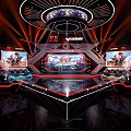 Futuristic Esports Competition Stage With Dazzling Red Neon Lights And Multiple Large Gaming Screens