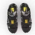 Black Tech Inspired Sneakers With Reflective Details Yellow Accents And Chunky Sole