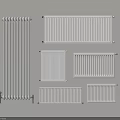 Various Styles And Sizes Of White And Silver Radiators Mounted On Light Colored Wall