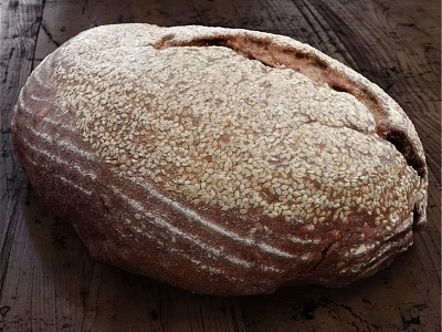 Freshly Baked Crusty Brown Bread With Sesame Seeds On Rustic Wooden Table 3d model
