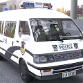 White Police Van With Roof Mounted Lights And POLICE Insignia On Exterior
