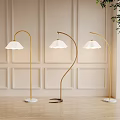 Modern Golden Floor Lamps With White Shades And Marble Bases In Decorative Wall Interior
