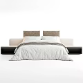 Double Bed With White Quilt Gray Stripes And Upholstered Headboard In Bedroom