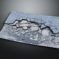 Damaged Asphalt Road Ground with Visible Cracks and Scattered Broken Stones