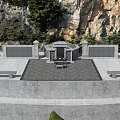 Traditional Chinese Stone Ancestral Tomb Site With Complete Worship Altar Under Natural Rocky Mountain Backdrop