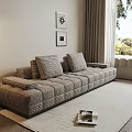 Plush Checkered Multi person Sofa In Living Room With Area Rug Artworks And Natural Light