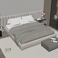 Modern Double Bed with Beige Upholstered Headboard Gray Quilt Ottoman Magazines and Wooden Floor Rug