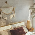 Natural Style Double Bed With Macramé Wall Hanging Palm Plants Bamboo Blinds And Woven Rug