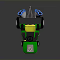 Green Toy Tractor With Yellow Seat Blue Exhaust Pipes And Silver Front Blade