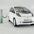 White Electric Car Charging at Green Charging Station with Connected Cable