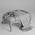 Luxurious White Leather Sofa Stool With Plaid Blanket And Carved Wooden Legs
