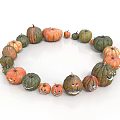 Fresh Colorful Pumpkins Arranged In Circle With Carved Faces And Various Sizes