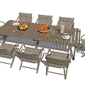 Outdoor Table With Wicker Chairs Fruits And Coffee Cups In Patio Setting