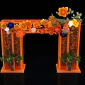Event Archway with Orange Frame Decorated by Colorful Flowers and Green Plants