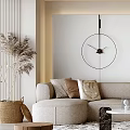 Modern Living Room With Beige Sofa Embroidered Cushions Round Wall Clock And Pampas Grass