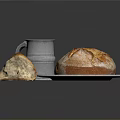 Fresh Crusty Bread On Silver Plate With Sliced Piece And Silver Mug And Crumbs