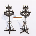 Vintage Metal Candelabra With Multi Tiered Design And Decorative Iron Base