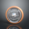 3D Rendered Object With Orange Outer Ring Central Silver Sphere And Reflection On Black Background