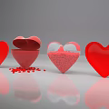 Red Heart Shaped Decorative Ornament Set with Open Lids and Scattered Small Red Particles