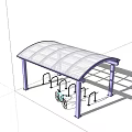 Transparent Canopy Covered Outdoor Bike Parking Area With Green Trees And Paved Ground
