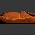 Heart Shaped Bread with Golden Crust Dark Swirl Patterns and Shiny Surface on Black Background