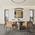 Elegant Circular Dining Table Set With Beige Chairs Pendant Light And Decorative Painting