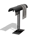 Black Coat Rack With Curved Top Two Upright Poles Square Base And Gray Towel Hanging