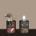 Stylish Black Bedside Tables With Colorful Patterns Floral Bouquet Candle Gold Candleholders And Books