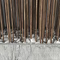 Bamboo Sticks Decorative Wall Design With Natural Arrangement And Pebble Base