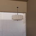 White Pleated Pendant Light Hanging Above Window With Blinds In Modern Interior Room