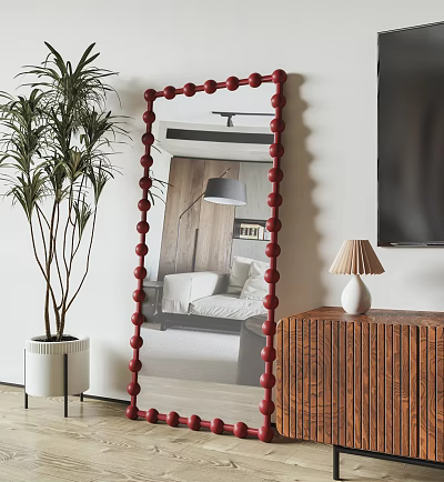 Red Beaded Frame Mirror Reflecting Bedroom Scene Green Plant Wooden Cabinet and White Table Lamp 3d model