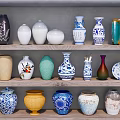 Ceramic Vessels on Multiple Shelves with Various Colors and Different Shapes